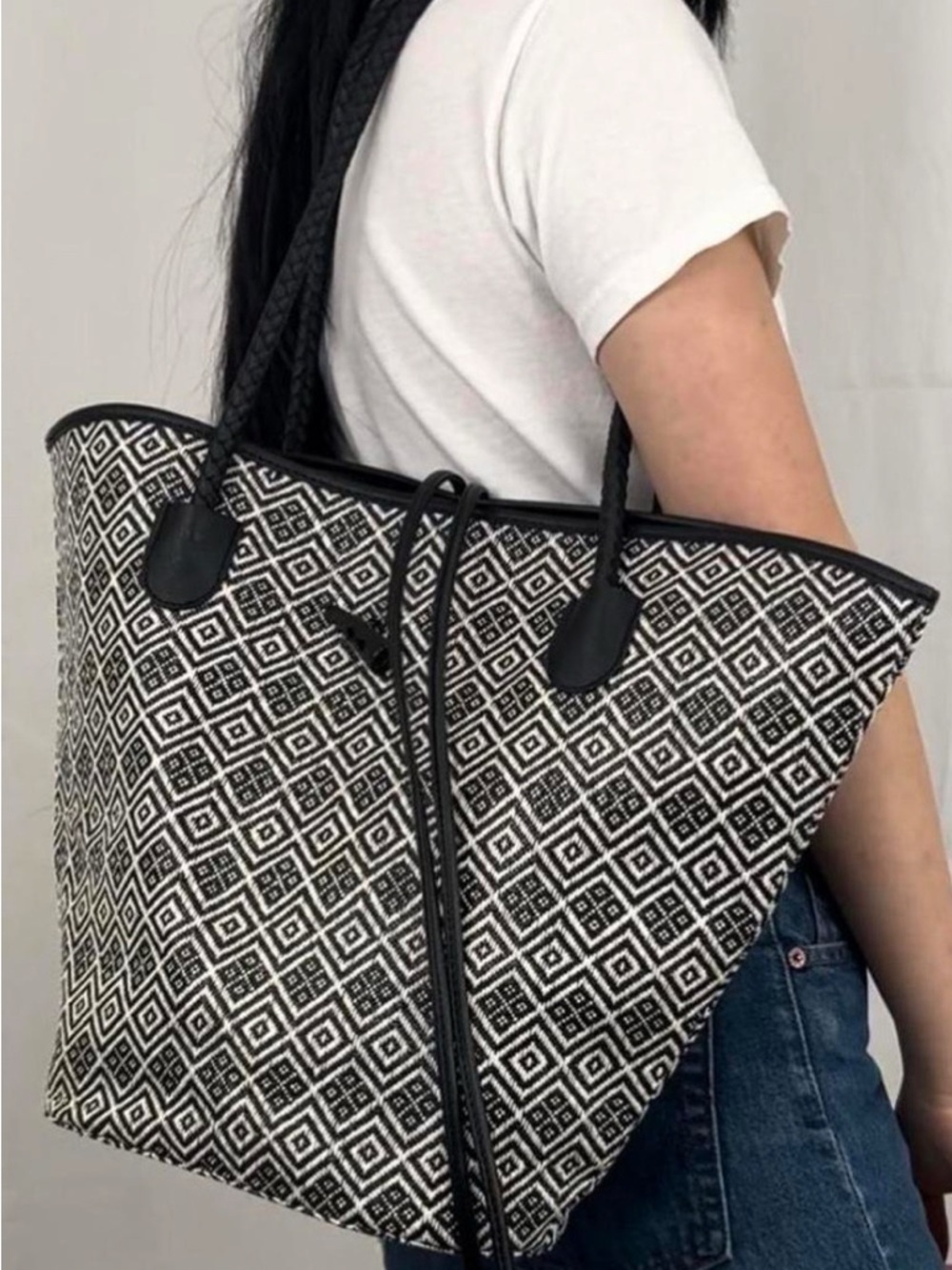 Neiman Marcus Tote bag coated raffia/strawlike woven style w/ Braided Handles